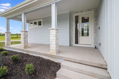 1811 Halls Creek Ave, Raymore, MO 64083 - photo 3