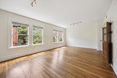 Large living with abundant natural light that has