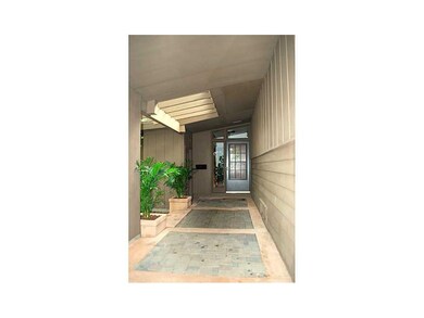 Entryway. Partially covered walkway at the front o