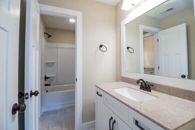 Example of the home being built on this lot