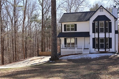 View of front of house with covered porch