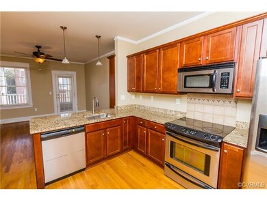 Large, Open Kitchen, w/ Granite Countertops, Stainless Steel Appliances, Hardwood Floors, Cherry Cabinets, New Paint