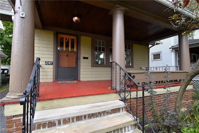 Property entrance with a porch