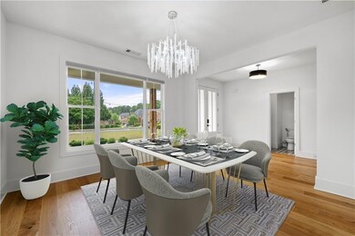Dining area with an inviting chandelier, visible v