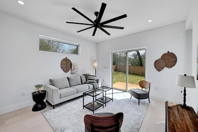 Living area featuring recessed lighting, baseboar