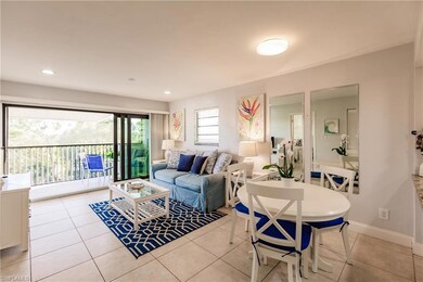 Living room featuring light tile patterned floorin