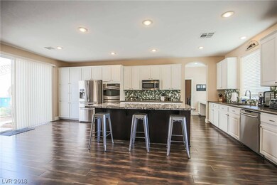 Remodeled kitchen includes granite counter tops, n