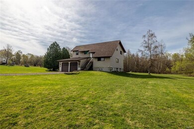 The home provides a large front and back yard.