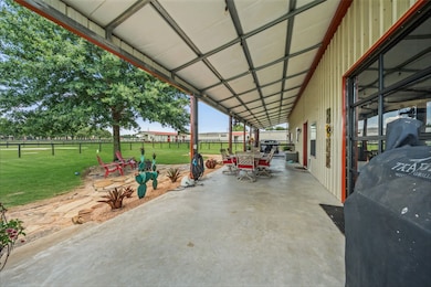 Enjoy stunning sunset views from the 12’x60’ front