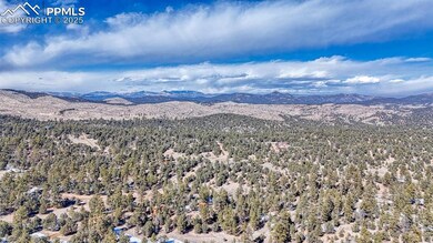 Mountain view featuring a wooded view