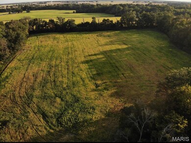 Aerial overview of property's location featuring rural landscape