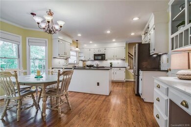 Enjoy the unobstructed view of the open kitchen an
