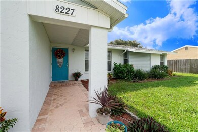 Covered paver deck entryway.