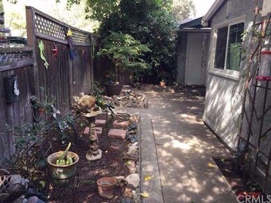 This home features  nice concrete walkways down th
