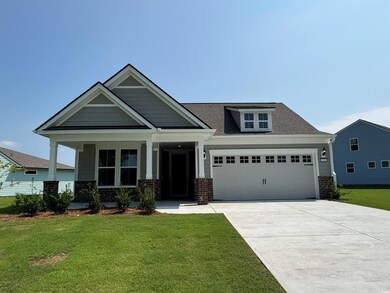 Craftsman-style house featuring a garage, a porch,