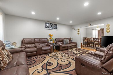 Living area with recessed lighting and wood finished floors