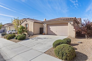 Mediterranean / spanish home featuring stucco siding, a tile roof, driveway, and a 3car tandem garage