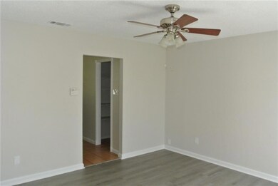 Another view of the front living room, the walk-in