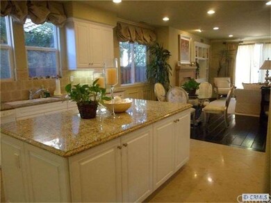 Kitchen Island View and opened to the Family Room