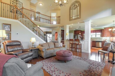 Family Room and Kitchen (Note: Mirror above bar/counter does not convey)