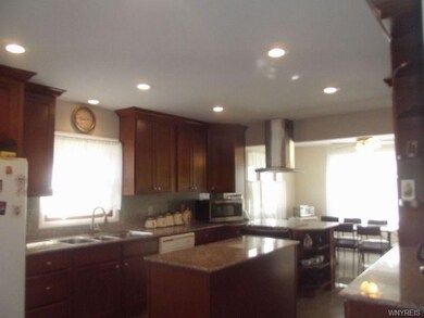 kitchen looking to spacious eating area
