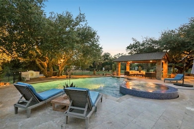 View of pool featuring a gazebo, a patio, an outd