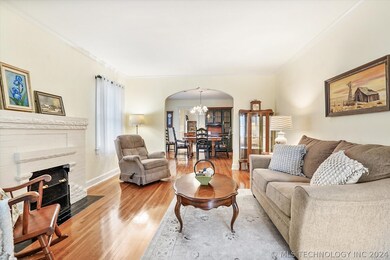 A formal living room greets you from the front ent