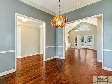 Dining Room view into Foyer and Family Room