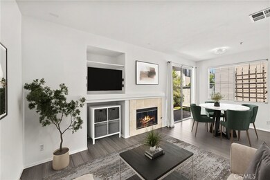 Living room flows into dining room and kitchen.
Digitally staged.