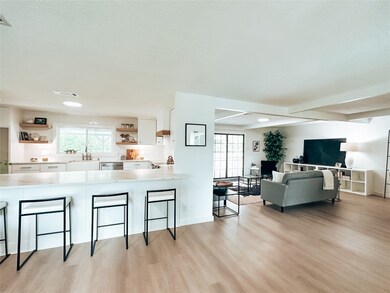 This open floor plan offers seamless movement from one room to the next which is perfect for hosting your next gathering.