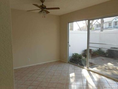 Large dining area adjacent to kitchen with view of