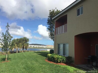 Rear of home with balcony and patio