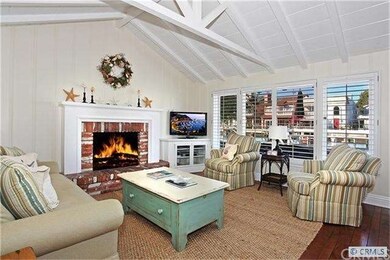 Large Family Room with Beamed Ceilings & Water Vie