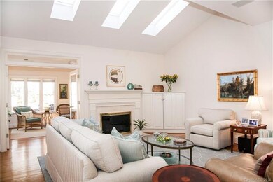 Vaulted ceilings with skylights make this living a