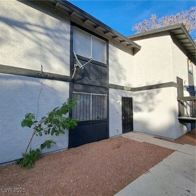 Doorway to property featuring stucco siding