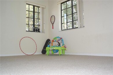 This is one of the 4 bedrooms with a corner window