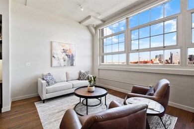 Living room featuring dark wood-type flooring and 