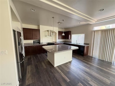 Kitchen with appliances with stainless steel finis