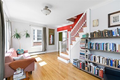 Enter through a small foyer into this view of the
