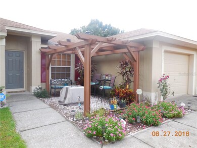 Inviting entry with beautiful garden sitting area 