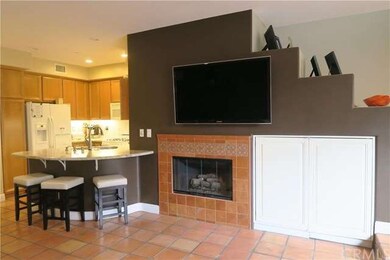 View from the family room. Custom tile around fire