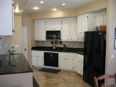 Upgraded kitchen with granite counter-tops, stainl