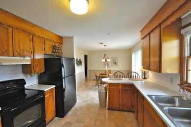 Plan the Meal! Great Kitchen featuring a large dining area. 