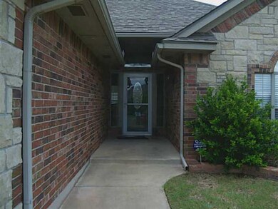 Exterior Front. Nicely landscaped front and back.