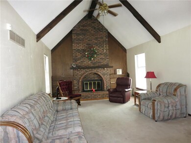 Vaulted ceiling in great room gives spacious feeli