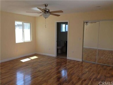 Looking into master bedroom toward bath and walk i