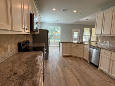 Kitchen, granite counters, glass tile backsplash,