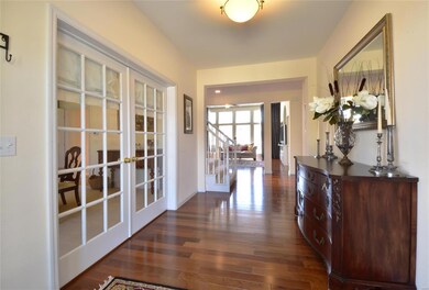 GOREGOUS cherry wood flooring in entry foyer carri