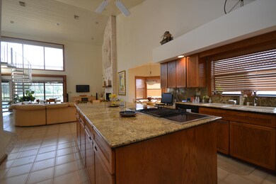 Spacious Center Island Granite Kitchen