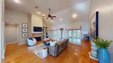 Living room featuring light hardwood / wood-style 